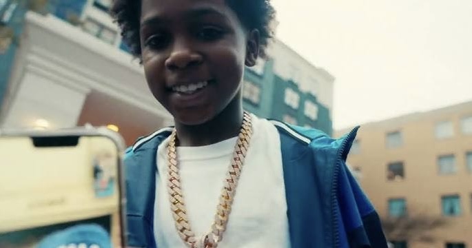 Man Trolls Lil King After Spotting Him Selling Water Bottles On The Streets 
